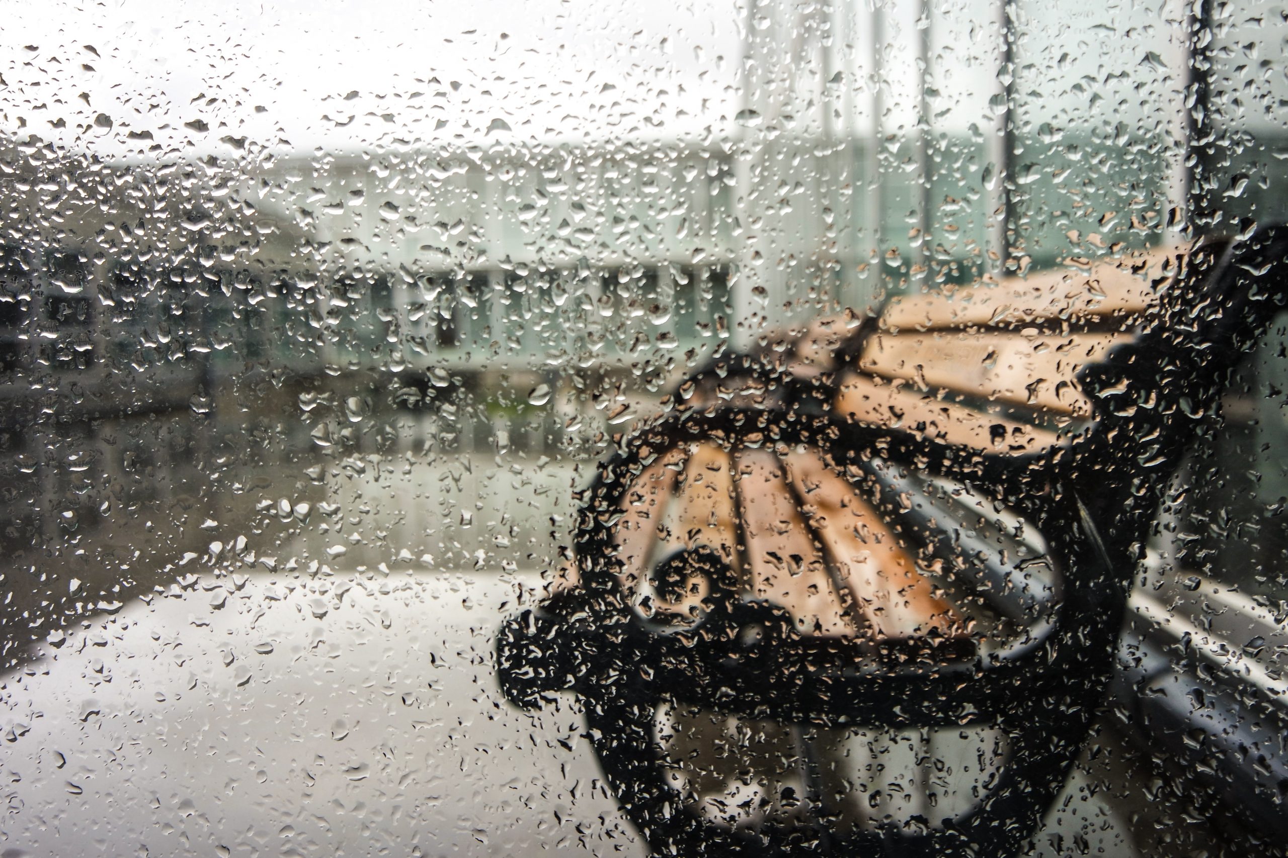 Raining On Wooden Bench